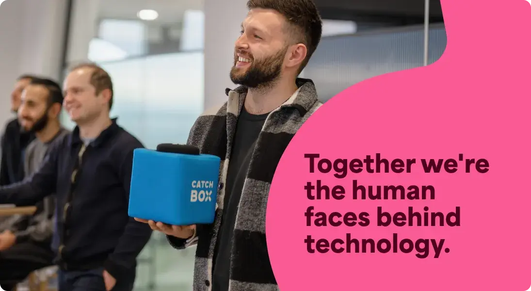 A photo of Dan Reidy smiling at his colleagues. It has a text overlay that says Together we're the human faces behind technology.